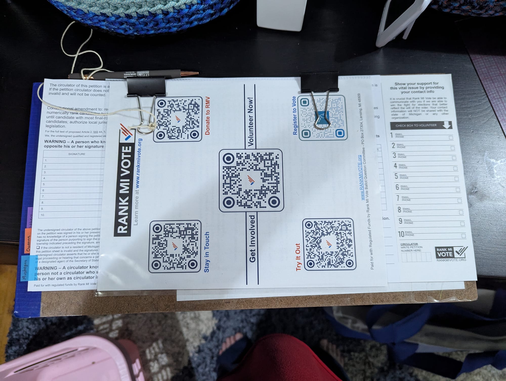 A petition clipboard for Rank MI Vote, the ranked choice voting petition